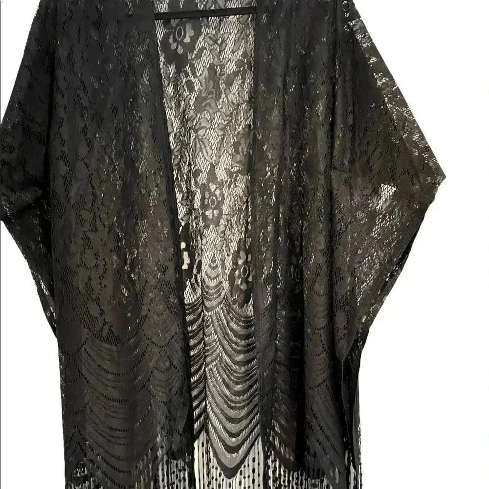 Beautiful lace and fringe swim coverup